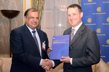 Chair of the Working Group, Dr the Hon Vasant K Bunwaree, Minister of Education and Human Resources, Mauritius, presents the recommendations to Mr David Hallam, representing the British Prime Minister, David Cameron, co-chair of the United Nations High Level Panel of Eminent Persons on the Post-2015 Development Agenda. © Commonwealth Secretariat 2012